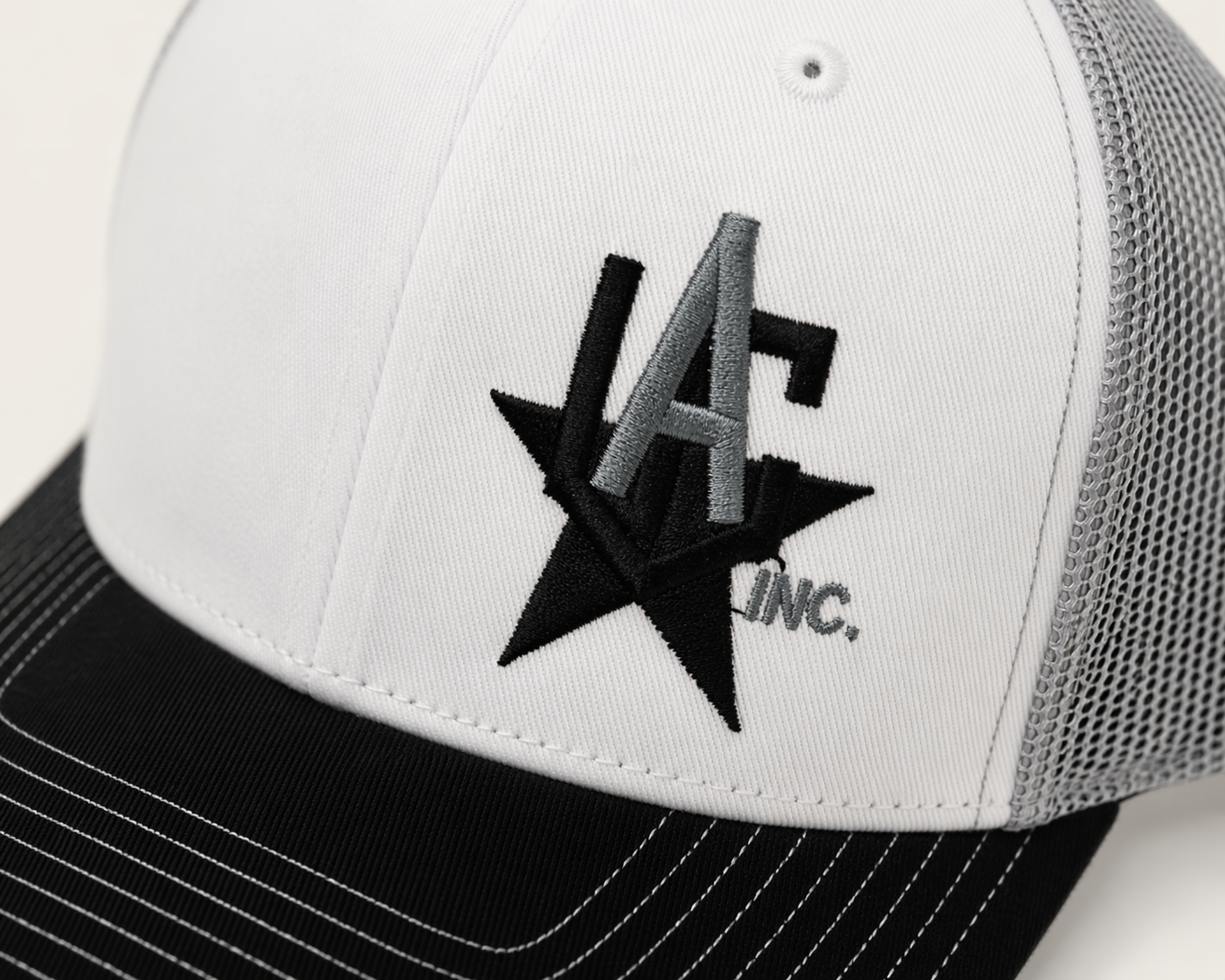 Custom embroidered trucker hats flat lay - Lakeside Ink & Threadz, Onalaska TX
