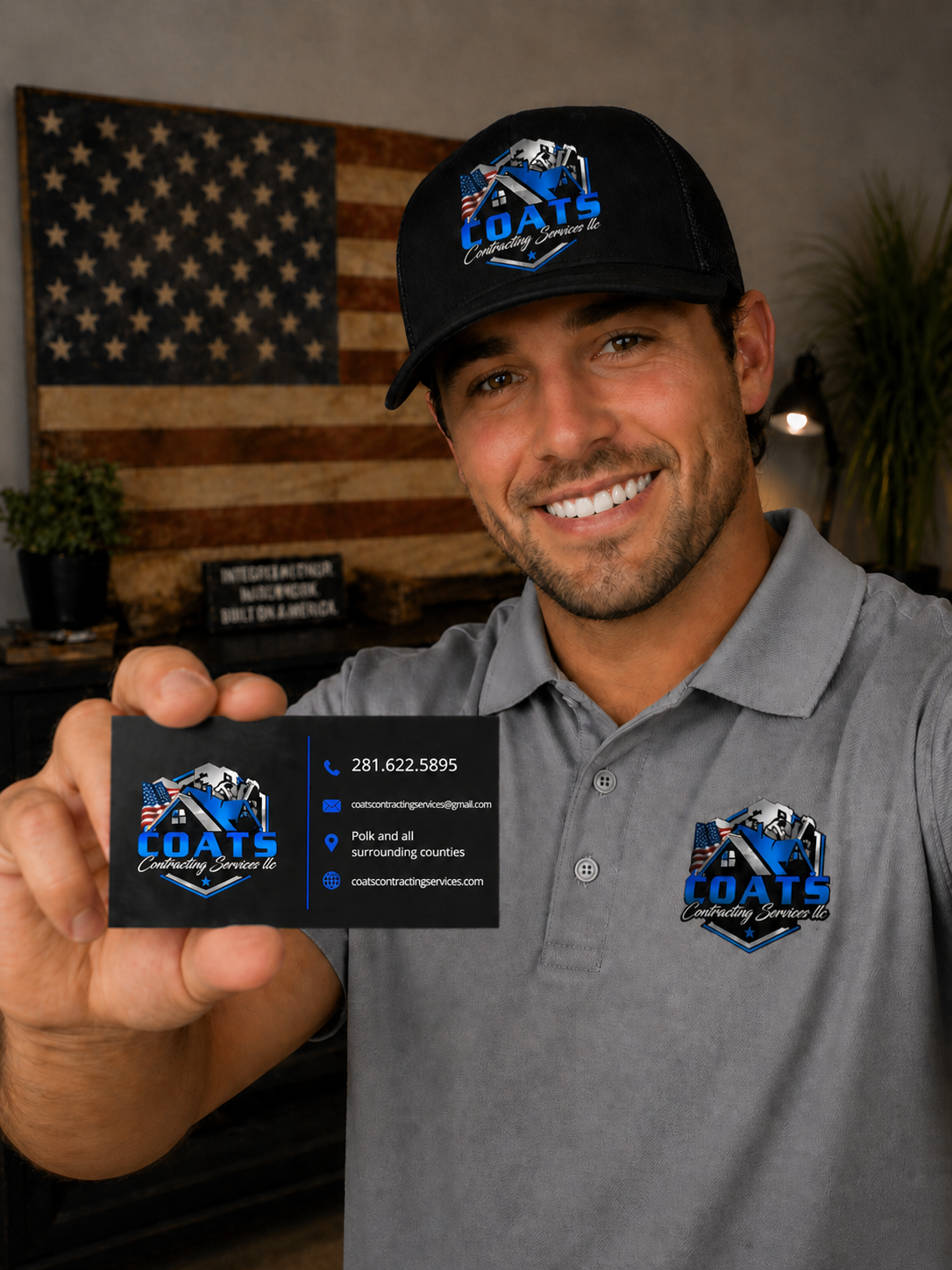 Coats Contracting Services man with branded hat polo and business card - Lakeside Ink & Threadz, Onalaska TX